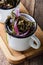 Sea kale salad with red onion in rural white mugs