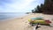 Sea kayak at the lonely sandy beach. Active water sport and leisure, kayaking