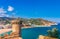 Sea landscape Badia bay in Tossa de Mar in Girona, Catalonia, Spain near of Barcelona. Ancient medieval castle with nice sand