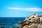 Sea landscape with rocks and concrete tetrapods for coastal protection from breakwaters