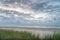 Sea landscape, during sunset, clear blue cloudy sky on the beach, Ameland Netherlands, dutch landscape