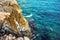 Sea landscape wallpaper background with island cliffs and ocean hitting rocks