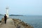 The sea and a lighthouse and angler of Wakayama