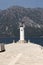 Sea lighthouse on the island of Gospa-od-Shkrpjela in the Bay of Kotor