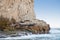 Sea lions on rocky shoreline