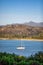 Sea and mountains with sailing boat. Mediterranean sea.