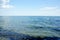 sea. ocean. sea surface. almost calm. horizon line. clear water and light clouds. Sea of Azov