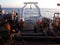 The Sea of Okhotsk / Russia - July 17 2015: Science expedition team on the stern of RV Akademik Lavrentyev hoisting equipment up w