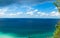 Sea panorama with cargo container ships.  Blue sky with clouds.