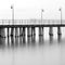 Sea pier at the Baltic Sea shoreline in Gdynia Orlowo, Poland at evening twilight