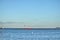 Sea plane flies above the grain ship - Thunder Bay Marina, Ontario, Canada