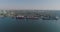 Sea port from the air. Cargo port with large ships and cranes.