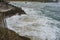 Sea raging wild waves in the sea of the city of Santander, Spain