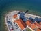 Sea resort cape with red roof houses Piran town