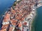 Sea resort cape with red roof houses Piran town