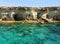 Sea rocks limestone crags blue water landscape