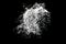 Sea salt explosion isolated on black background close up