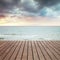 Sea, sand and wooden pier perspective