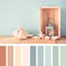 Sea shells and lantern on wooden table. vintage filtered image. nautical lifestyle concept. with palette color swatches