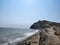 Sea sky beach surrounded by rocks