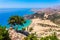 Sea skyview landscape photo Tsambika bay on Rhodes island, Dodecanese, Greece. Panorama with nice sand beach and clear blue water