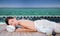 Sea and spa turquoise beach chiropractic massage therapy woman