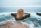 A Sea Stack takes on incredible storm waves near Santa Cruz California