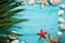 Sea stars, sea stones, palm leaves and shells lying on a blue wooden background . There is a place for labels.