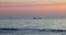 Sea sunrise and sailing industrial cargo ship, travel and logistic