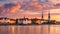 Sea sunset colorful evening sky and moon on cloudy skyline, light reflection on