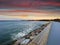 Sea sunset colorful sky ,Sea sunset colorful sky ,skyline,  light reflection on seawater, seafront promenade and stones on beach,b