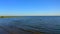 Sea at sunset. Nice view of the beach and the blue sea.