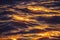 Sea sunset and ocean ripples waves as water texture background