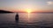 Sea surface with sail boat sunset. Small yacht boat sailing calm open sea