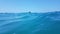 Sea surface waves diving blue sea