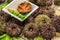 Sea urchins, exposed in plastic tray cut and whole in the Boqueria market