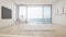Sea view living room of luxury summer beach house with large glass door and wooden terrace.