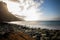 Sea view, marine panorama of the coast at sunset, sea, mountains, rocks, clouds and waves with soft light. Tenerife island coast