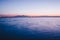 Sea view from the port of salonicco at sunset with a boat on the