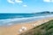 Sea view by the sandy beach against blue and cloudy sky in Kilyos, Black Sea Region in Istanbul