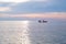 The sea view when the sunset. the clear skies with beautiful clouds. There were young men and women rowing in the middle of the
