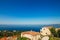 The sea view from the window. Montenegro Coast. The roofs of the