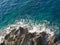 Sea water that breaks powerfully on the rocks