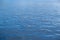 Sea water surface calm with small ripple. Ocean, deep blue color background. Aegean Sea