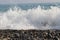 sea wave breaks up into a spray