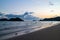 Sea wave moving to the beach with green islands and blue, yellow sky in background at the evening in Koh Mak Island at Traà¸°.