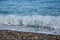 Sea wave on pebbles