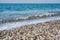 Sea wave on a pebbly beach