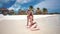 Sea wave wets Woman sitting on the beach. Caribbean Sea.