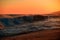 Sea waves background. Sunset over sea with golden dramatic sky panorama. Calm sea with sunset sky. Ocean and sky